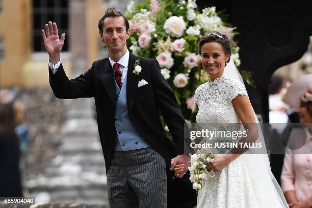 Pippa Middleton and her new husband James Matthews leave St Mark's Church in Englefield, west of London, on May 20, 2017 following their wedding...