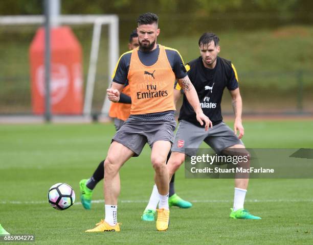 Olivier Giroud and Carl Jenkinson of Arsenal during a training session at London Colney on May 20, 2017 in St Albans, England.