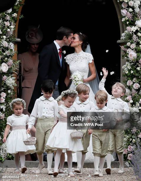 Pippa Middleton and James Matthews kiss after their wedding at St Mark's Church on May 20, 2017 in Englefield, England.Middleton, the sister of...