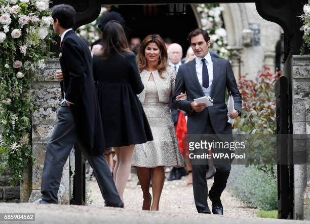 Roger Federer and his wife Mirka leave after the wedding of Pippa Middleton and James Matthews at St Mark's Church on May 20, 2017 in Englefield,...