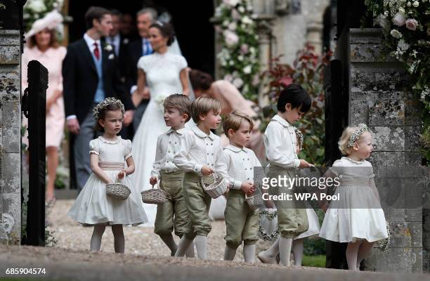 Prince George, fourth left, stands with other flower boys and girls after the wedding of Pippa Middleton and James Matthews at St Mark's Church onMay...