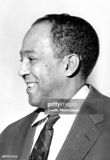 Profile portrait of American author, activist, and journalist Langston Hughes as he laughs, New York, New York, March 2, 1959.