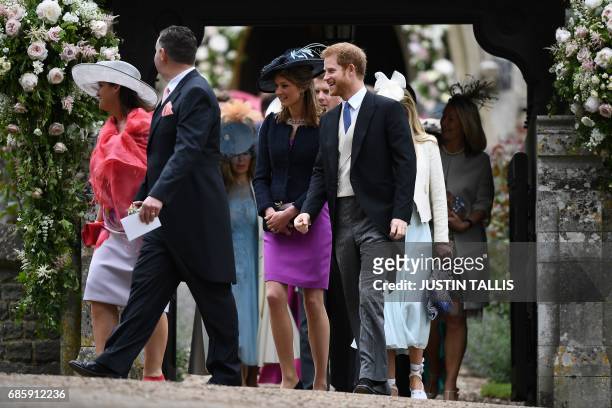 Britain's Prince Harry leaves St Mark's Church in Englefield, west of London, on May 20 after attending the wedding of Pippa Middleton to James...