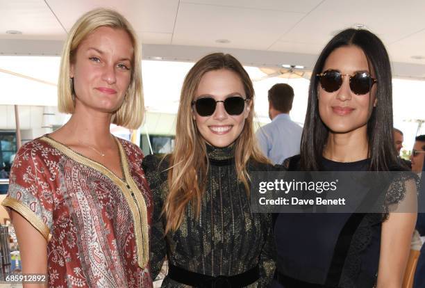 Alexandria Jackson, Elizabeth Olsen and Julia Jones attend a lunch hosted by Lexus for The Weinstein Company's "Wind River" stars and director on May...