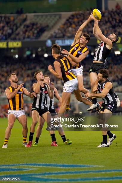 Alex Fasolo of the Magpies attempts to mark the ball during the round nine AFL match between the Collingwood Magpies and the Hawthorn Hawks at...
