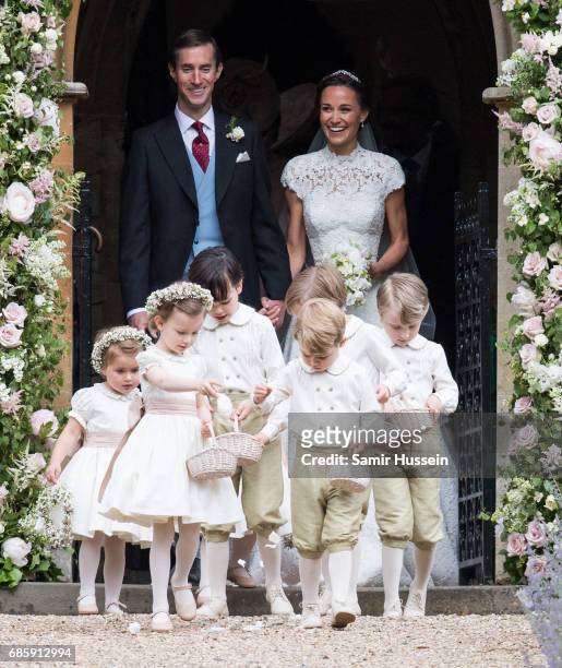 Pippa Middleton and James Matthews leave after getting married at the wedding Of Pippa Middleton and James Matthews at St Mark's Church on May 20,...