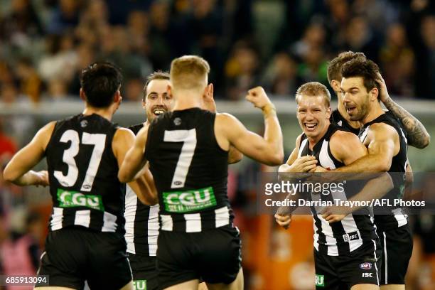 Josh Smith of the Magpies celebrates a goal during the round nine AFL match between the Collingwood Magpies and the Hawthorn Hawks at Melbourne...