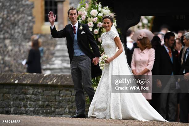 Pippa Middleton and her new husband James Matthews leave church following their wedding ceremony at St Mark's Church as the bridesmaids and pageboys...