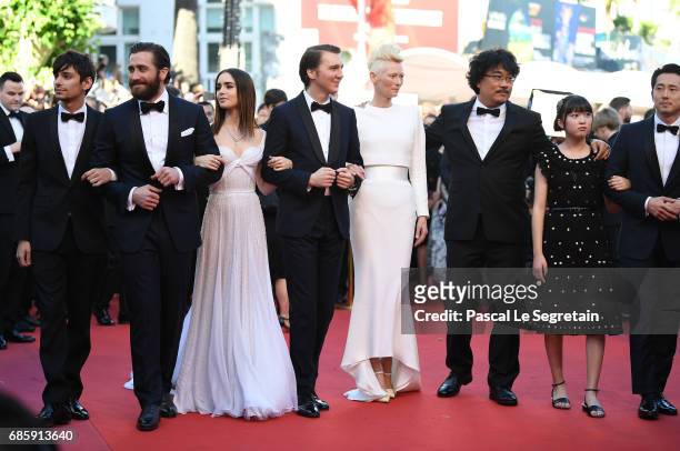 Actors Devon Bostic, Jake Gyllenhaal, Lily Collins, Paul Dano, Tilda Swinton, director Bong Joon-Ho, actors Ahn Seo-Hyun and Steven Yeun attend the...