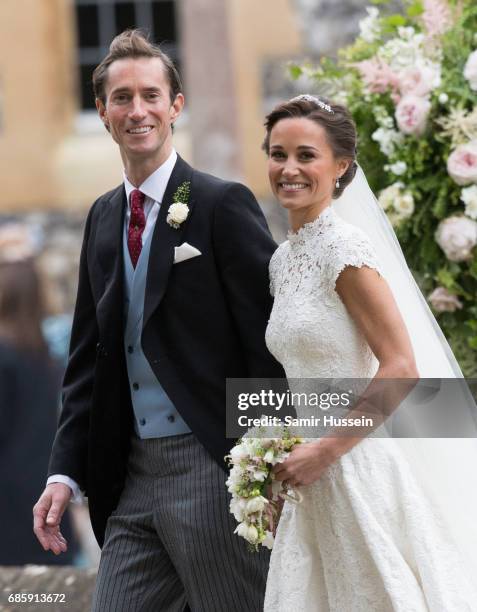 Pippa Middleton and James Matthews leave after getting married at the wedding Of Pippa Middleton and James Matthews at St Mark's Church on May 20,...