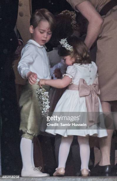 Princess Charlotte of Cambridge and Prince George of Cambridge attend the wedding Of Pippa Middleton and James Matthews at St Mark's Church on May...