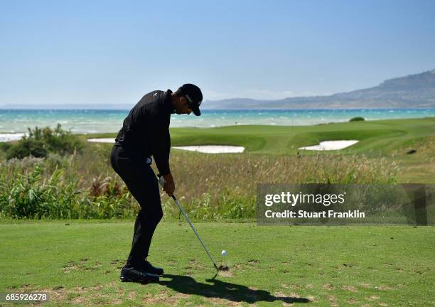 Alvaro Quiros of Spain plays a shot on the seventh hole during the third round of The Rocco Forte Open at The Verdura Golf and Spa Resort on May 20,...