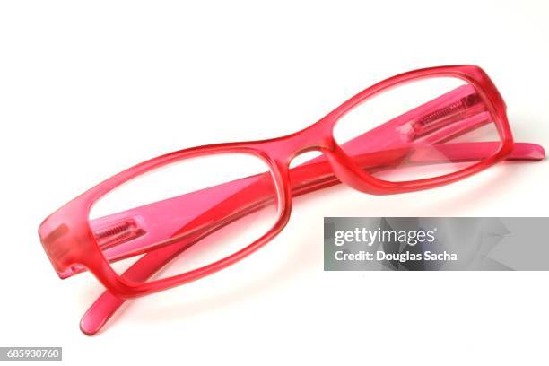 bright colored eye glasses on a white background - monacle glasses stock-fotos und bilder