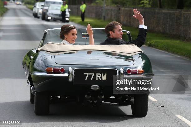 Bride Pippa Middleton and her new husband James Matthews seen leaving St Mark's Church in a classic car after their Wedding Ceremony on May 20, 2017...
