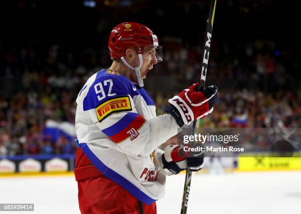 Yevgeni Kuznetsov of Russia celebrates after e scores the opening goal during the 2017 IIHF Ice Hockey World Championship semi final game between...