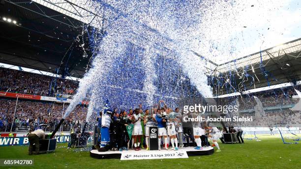 The team of Duisburg celebrate winning the Championship after the third league match between MSV Duisburg and FSV Zwickau at schauinsland reisen...