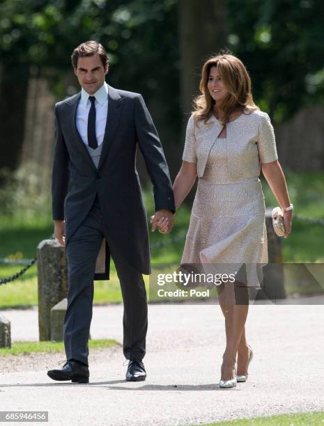 Roger Federer and Mirka Federer attend the wedding of Pippa Middleton and James Matthews at St Mark's Church on May 20, 2017 in Englefield Green,...