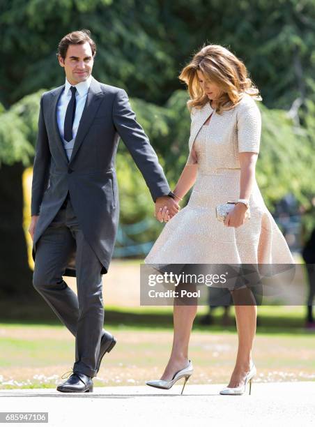 Roger Federer and Mirka Federer attend the wedding of Pippa Middleton and James Matthews at St Mark's Church on May 20, 2017 in Englefield Green,...