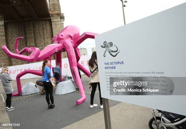 Guests attend the Family-Friendly 'Protect Like A Mother' Interactive Exhibit sponsored by Lysol at Brooklyn Bridge Park on May 20, 2017 in Brooklyn,...