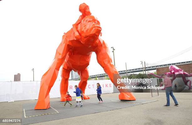 Guests attend the Family-Friendly 'Protect Like A Mother' Interactive Exhibit sponsored by Lysol at Brooklyn Bridge Park on May 20, 2017 in Brooklyn,...