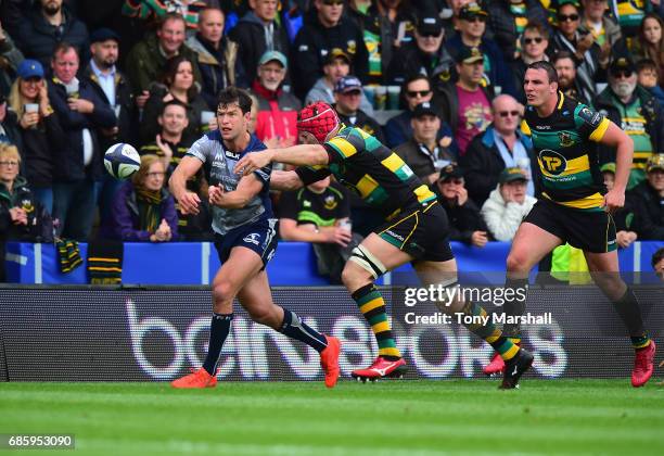 Christian Day of Northampton Saints tackles Danie Poolman of Connacht during Champions Cup Playoff match between Northampton Saints and Connacht at...