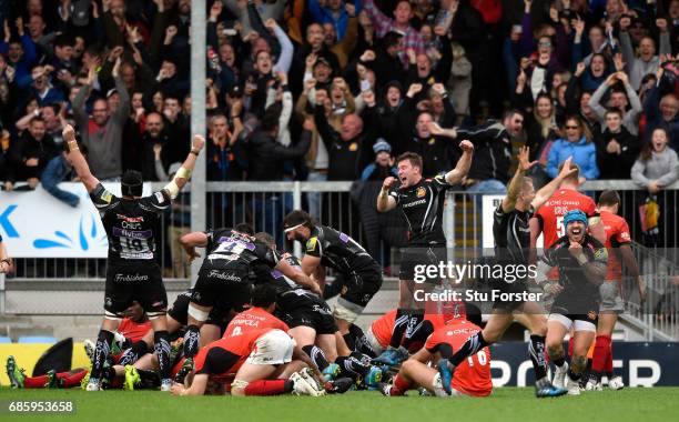 Chiefs players celebrate the last minute winning try during the Aviva Premiership match between Exeter Chiefs and Saracens at Sandy Park on May 20,...