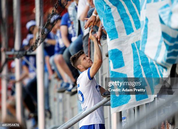 Klaas-Jan Huntelaar of Schalke 04 thanks the fans after the Bundesliga match between FC Ingolstadt 04 and FC Schalke 04 at Audi Sportpark on May 20,...