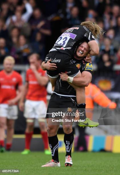 Chiefs player Jack Yeandle and Michele Campagnaro celebrate the last minute winning try during the Aviva Premiership match between Exeter Chiefs and...