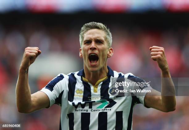 Steve Morison of Millwall celebrates victory and promotion after the Sky Bet League One Playoff Final between Bradford City and Millwall at Wembley...
