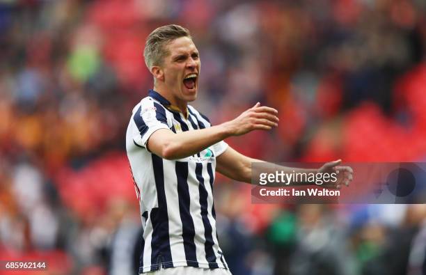 Steve Morison of Millwall celebrates victory and promotion after the Sky Bet League One Playoff Final between Bradford City and Millwall at Wembley...