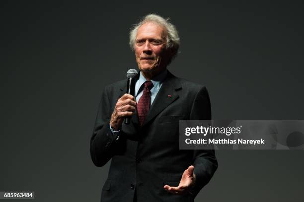 Clint Eastwood speaks on stage during the 'Unforgiven' restored copy presentation during the 70th annual Cannes Film Festival at Salle Debussy on May...