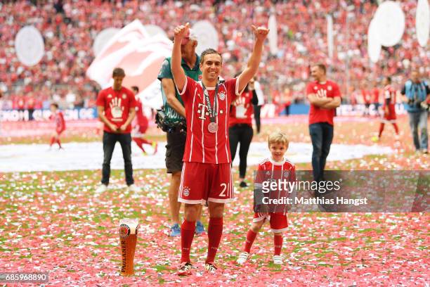Philipp Lahm of Bayern Muenchen waves to the fans after the presentation of the 67th German Championship title following the Bundesliga match between...