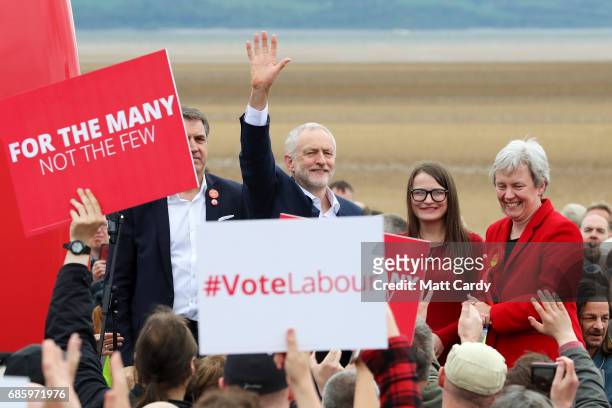 Labour Leader Jeremy Corbyn greets supporters as Labour Parliamentary Candidate for Wirral West Margaret Greenwood looks on during a campaign visit...