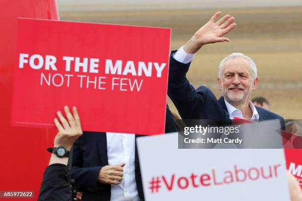 Labour Leader Jeremy Corbyn waves to supporters during a campaign visit in West Kirby on May 20, 2017 in the Wirral in Merseyside, England. All...