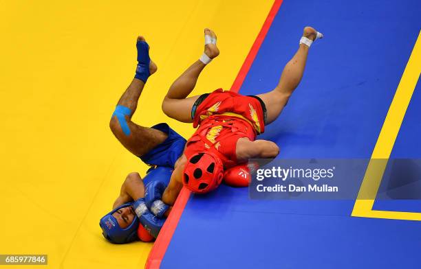 Abdullah Abdullah of Pakistan competes against Ruslan Puraliyev of Azerbaijan in the Mens Wushu 60kg Quarter Final during day nine of Baku 2017 - 4th...