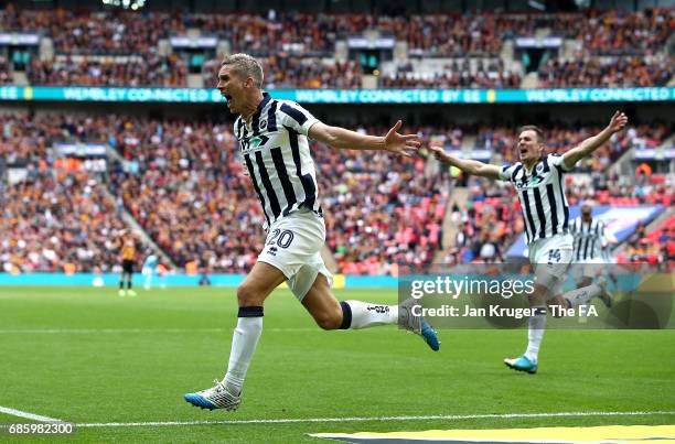 Steve Morison of Millwall celebrates after scoring the only goal during the Sky Bet League One Playoff Final between Bradford City and Millwall at...