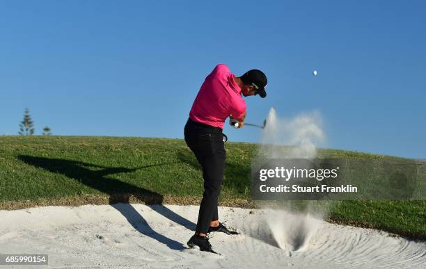 Alvaro Quiros of Spain plays a shot on the 18th hole during the third round of The Rocco Forte Open at The Verdura Golf and Spa Resort on May 20,...