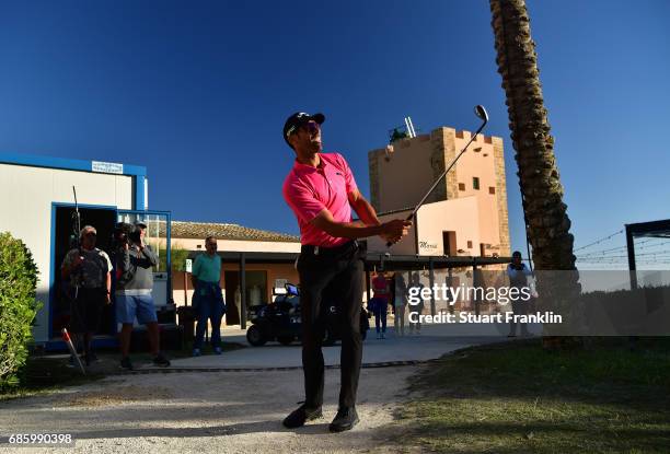 Alvaro Quiros of Spain plays a shot on the 18th hole during the third round of The Rocco Forte Open at The Verdura Golf and Spa Resort on May 20,...