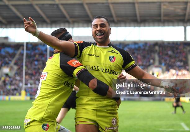 Telusa Veainu of Leicester Tigers celebrates with Peter Betham during the Aviva Premiership match between Wasps and Leicester Tigers at The Ricoh...