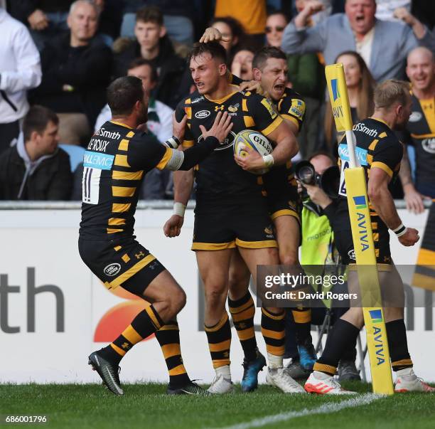 Josh Bassett of Wasps celebrates after scoring the last minute match winning try during the Aviva Premiership semi final match between Wasps and...