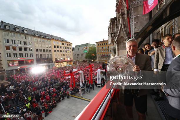 Carlo Ancelotti, Manager of Bayern Muenchen celebrates winning the 67th German Championship title on the town hall balcony at Marienplatz on May 20,...