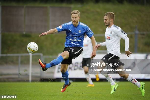 Alexander Ruud Tveter of Halmstad BK and Johan Martensson of Orebro SK competes for the ball during the Allsvenskan match between Halmstad BK and...