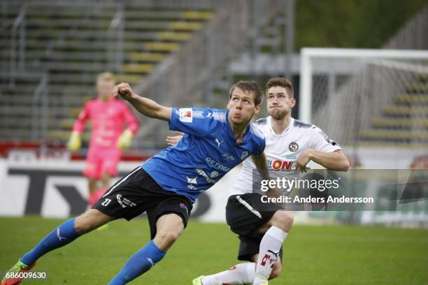 Marcus Johansson of Halmstad BK and Victor Skoldof Orebro SK competes for the ball during the Allsvenskan match between Halmstad BK and Orebro SK at...