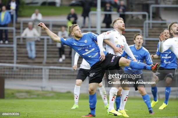 Alexander Ruud Tveter of Halmstad BK and Michael Almeback of Orebro SK competes for the ball during the Allsvenskan match between Halmstad BK and...