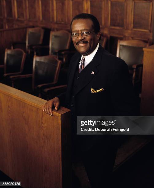 Deborah Feingold/Corbis via Getty Images) NEW YORK lawyer Johnnie Cochran poses for a portrait in 2002 in New York City, New York.