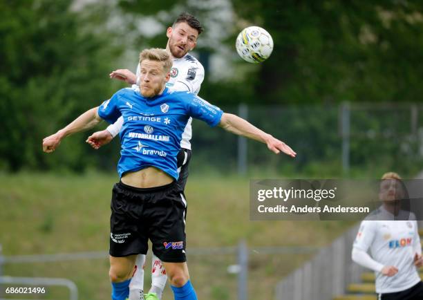 Alexander Ruud Tveter of Halmstad BK Brendan Hines-Ike of Orebro SK competes for the ball during the Allsvenskan match between Halmstad BK and Orebro...