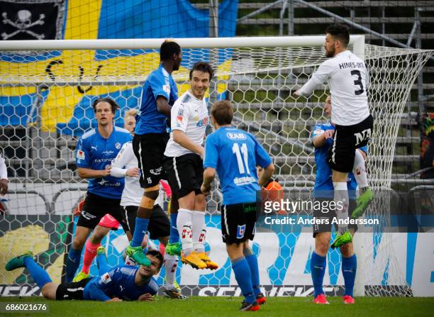 Nordin Gerzic smiles and jumps for a header during the Allsvenskan match between Halmstad BK and Orebro SK at Orjans Vall on May 20, 2017 in...