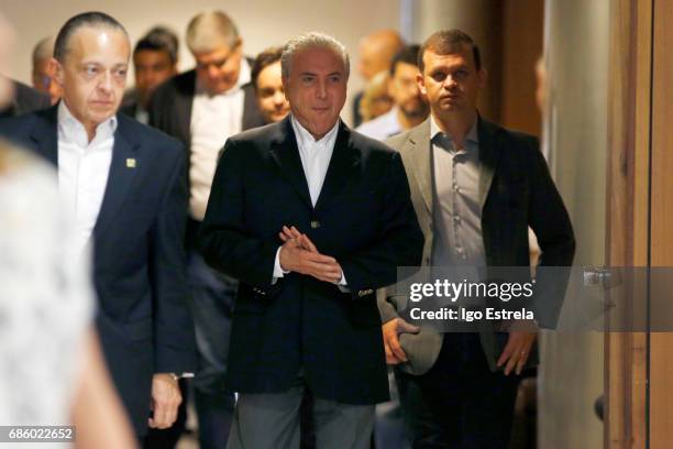 Brazilian President Michel Temer arrives to deliver a new statement following the release of a tape allegedly demonstrating him condoning bribery...