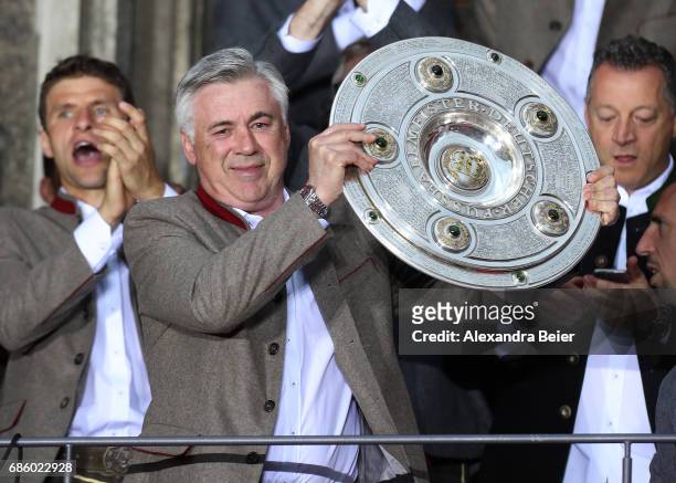 Carlo Ancelotti, Manager of Bayern Muenchen celebrates winning the 67th German Championship title on the town hall balcony at Marienplatz on May 20,...