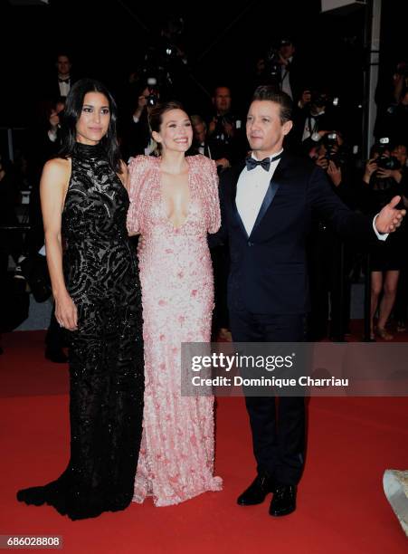 Actors Julia Jones, Elizabeth Olsen and Jeremy Renner attend "The Square" premiere during the 70th annual Cannes Film Festival at Palais des...